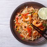 Rice noodles with shrimps and vegetables top view